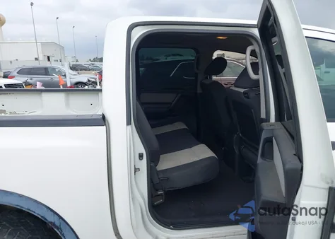 2012 Nissan Titan Pro-4X z USA, uszkodzony, nr VIN 1N6BA0EC4CN331256